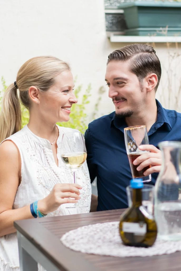 Couple enjoying their drinks on hotel terrace in Erlangen | Altstadt Hotel Grauer Wolf